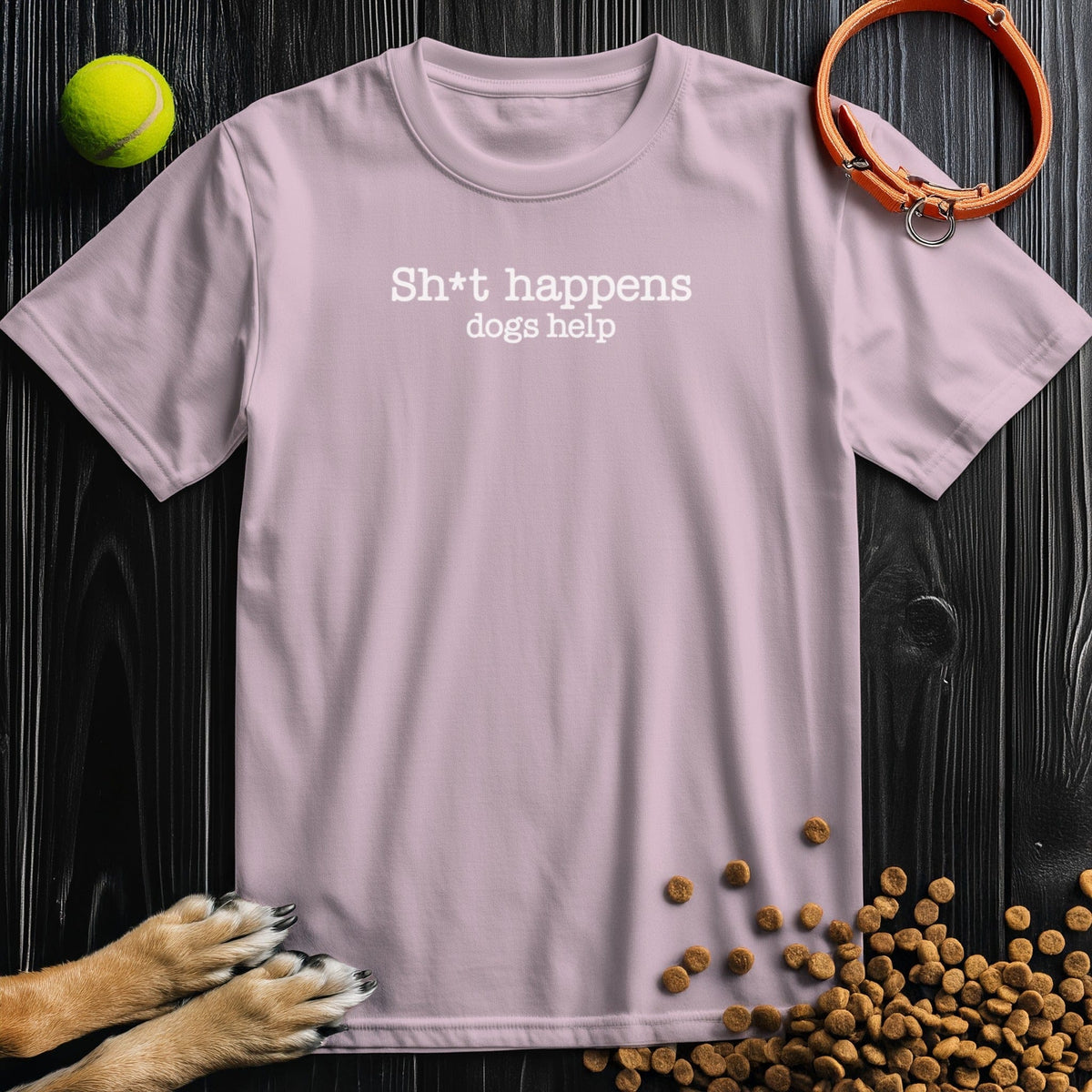 Light pink Sht Happens Dogs Help T-Shirt – cute and funny dog-themed tee.