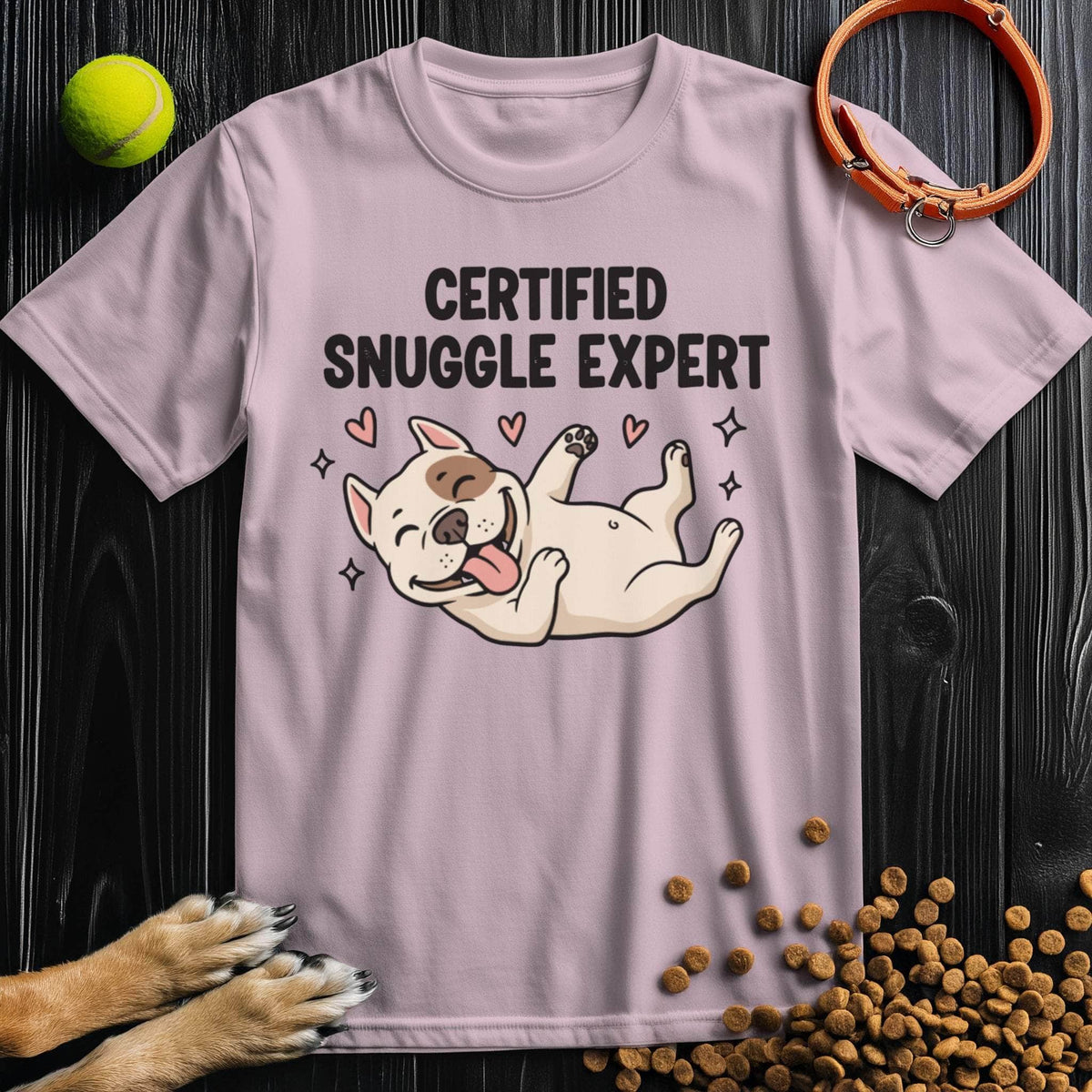 Light pink Certified Snuggle Expert T-Shirt with cute dog and hearts, part of the Dog Graphic Tees - Snuggle Expert cotton collection.