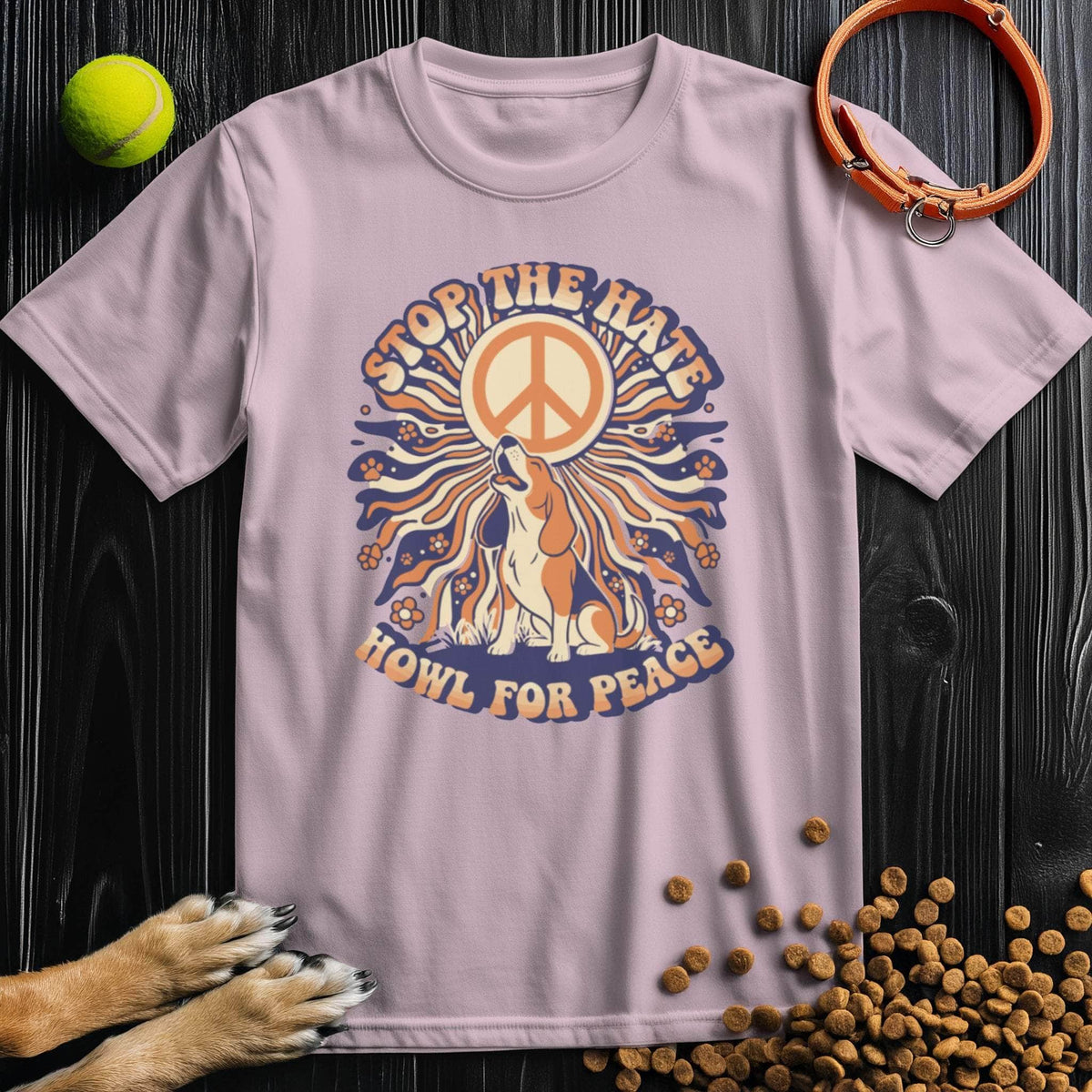 Light pink Howl For Peace T-Shirt with a retro dog and peace graphic. Unisex cotton shirt ideal for dog lovers and casual summer outfits.