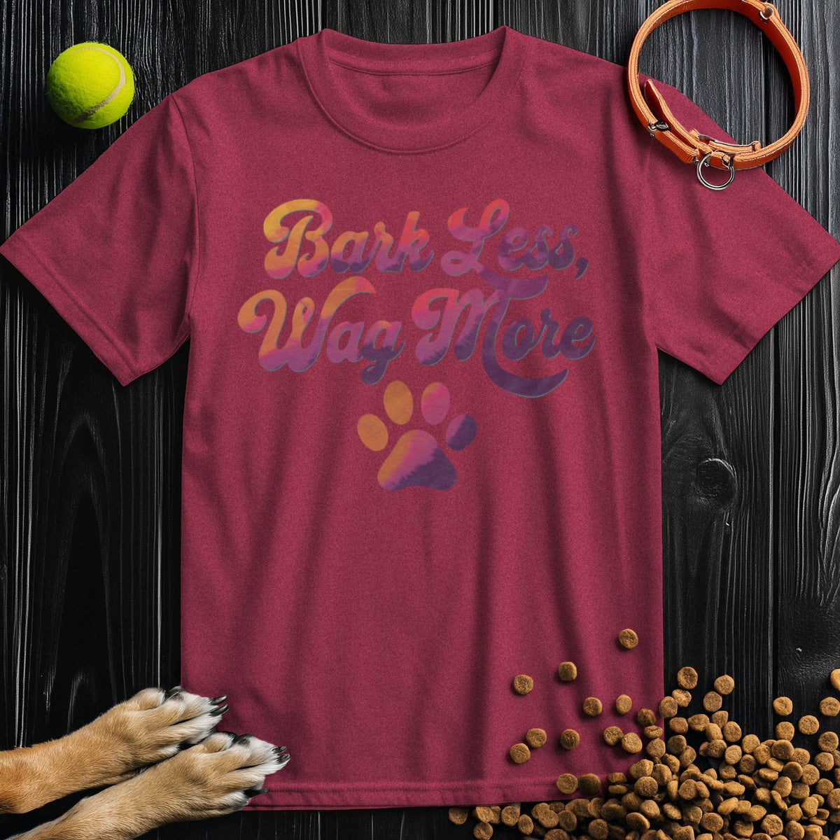 Dog Lover Shirt - Bark Less, Wag More in maroon, 100% cotton T-shirt with colorful typography and paw print, great gift for dog lovers.