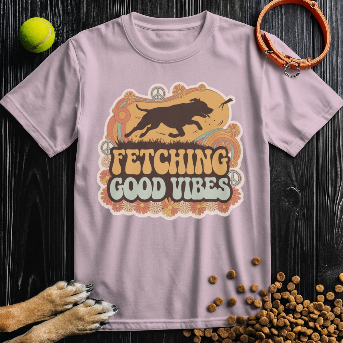 Light pink Good Vibes T-Shirt with playful dog fetch design. Ethically made cotton tee combining comfort, style, and pet-friendly vibes.