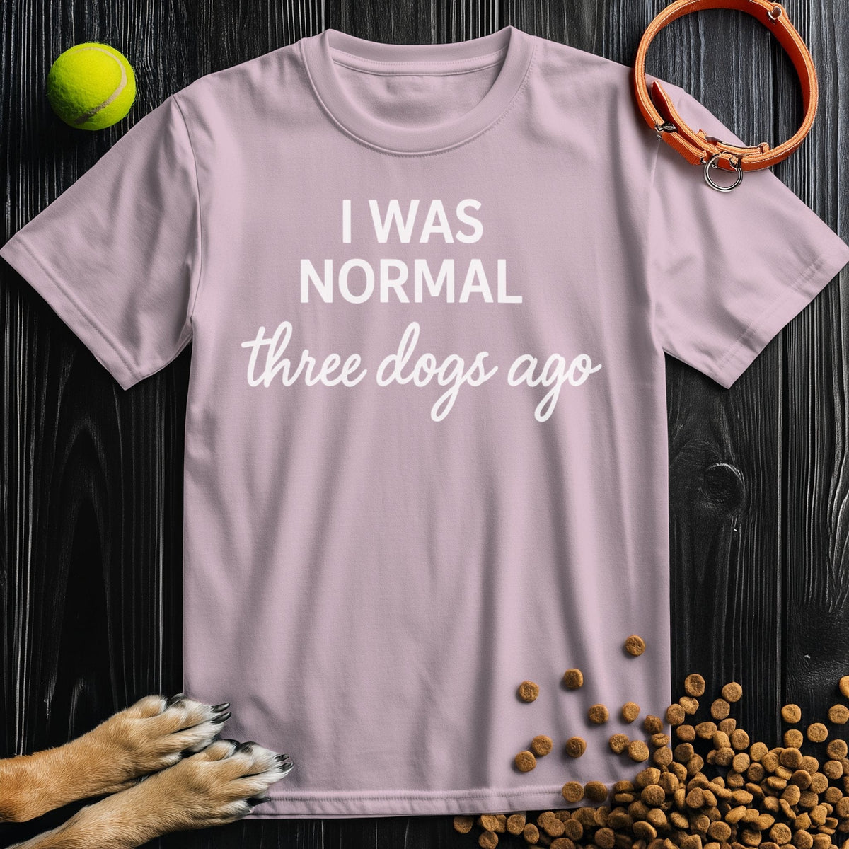 Front view of ‘I Was Normal 3 Dogs Ago’ dog tee in light pink