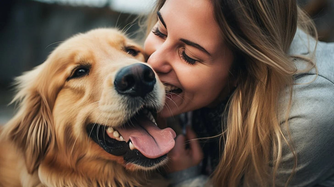 a dog and its owner with their faces next to each other