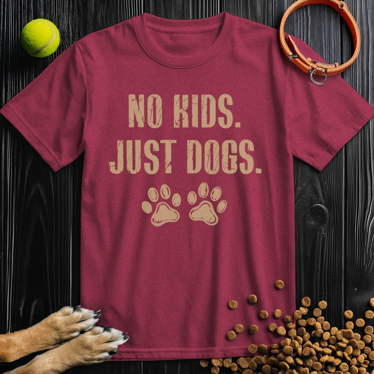 Maroon No Kids. Just Dogs T-Shirt with beige text and paw prints, a cozy cotton tee for dog lovers and casual fashion lovers.