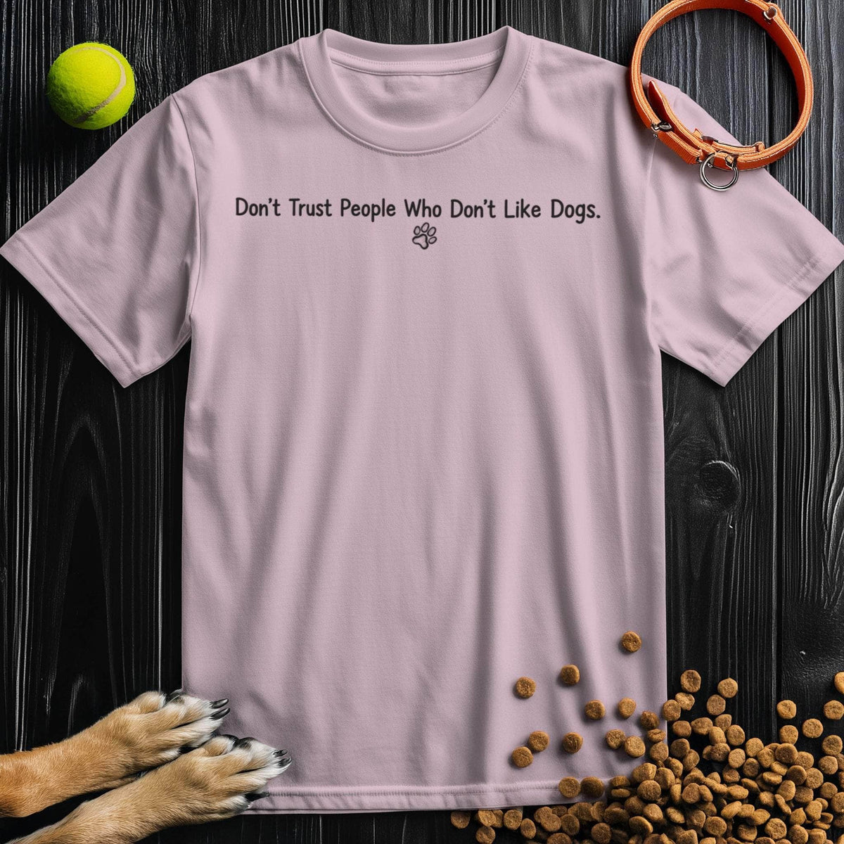 Light pink Dog Lovers T-Shirt with fun quote and paw design, 100% cotton tee perfect for dog moms and casual wear.