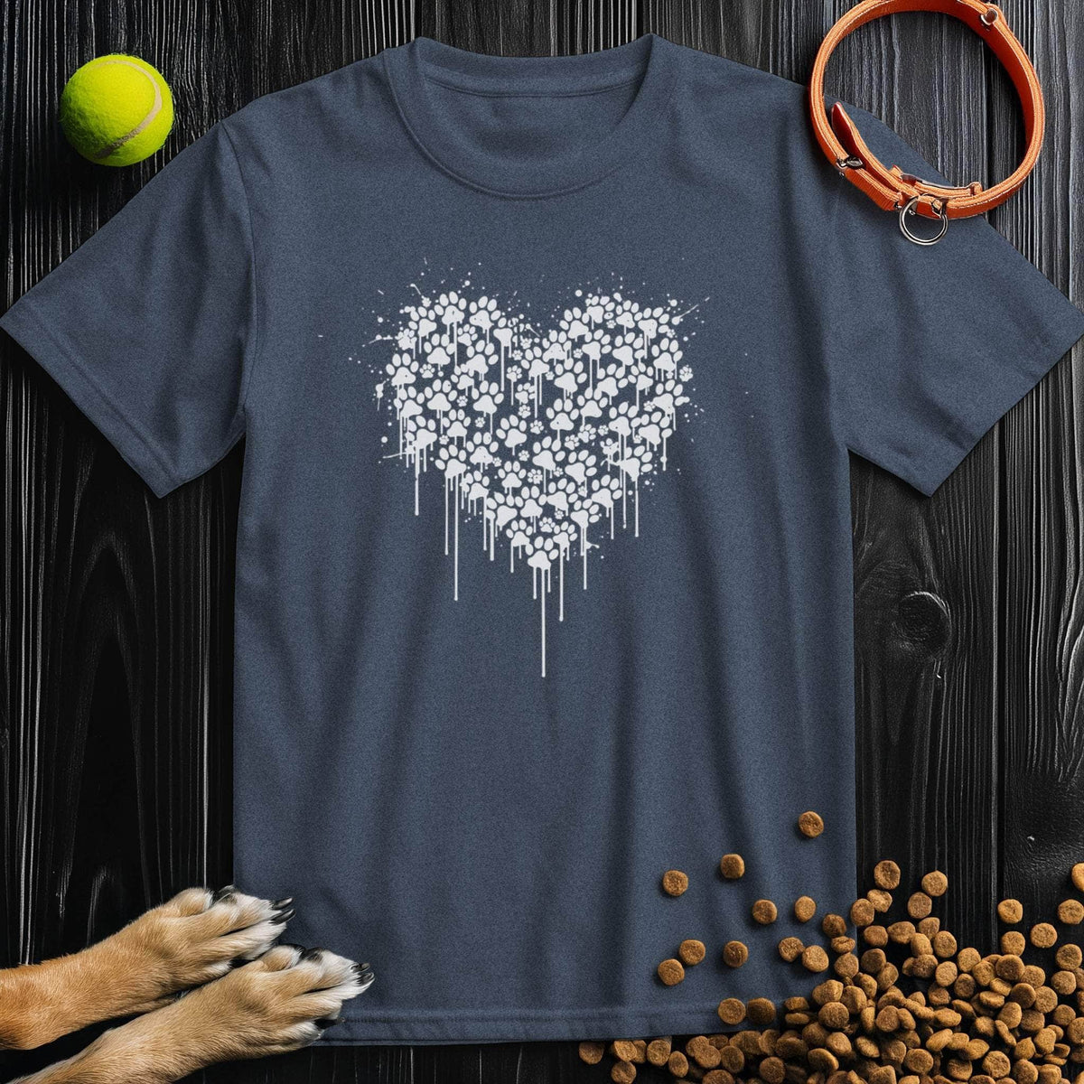Navy blue Pawstrokes T-Shirt with white paw print heart design. Stylish 100% cotton tee ideal for dog enthusiasts and casual wear.