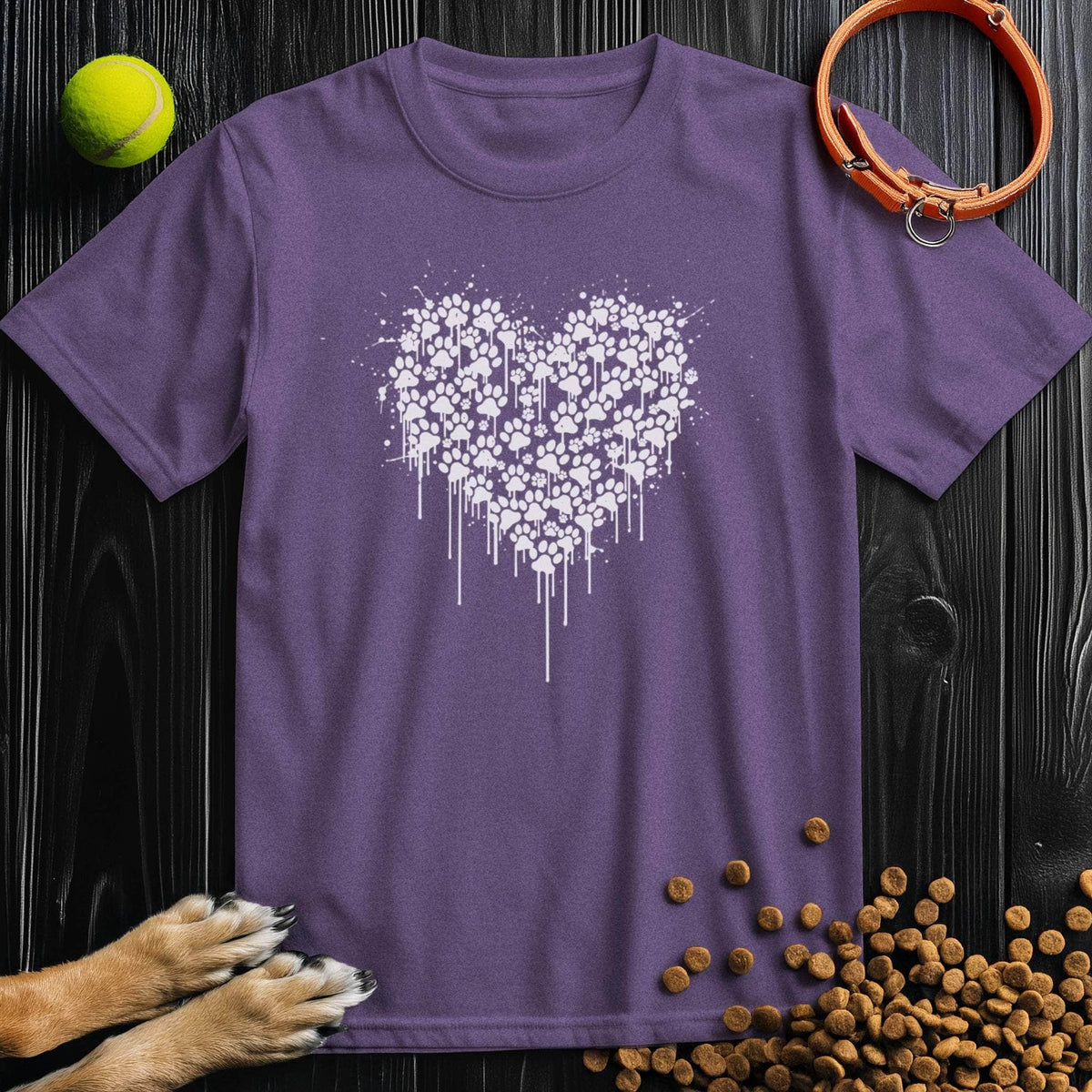 Purple Pawstrokes T-Shirt showcasing a dripping heart of white paw prints. A soft, 100% cotton shirt for dog lovers with a bold look.