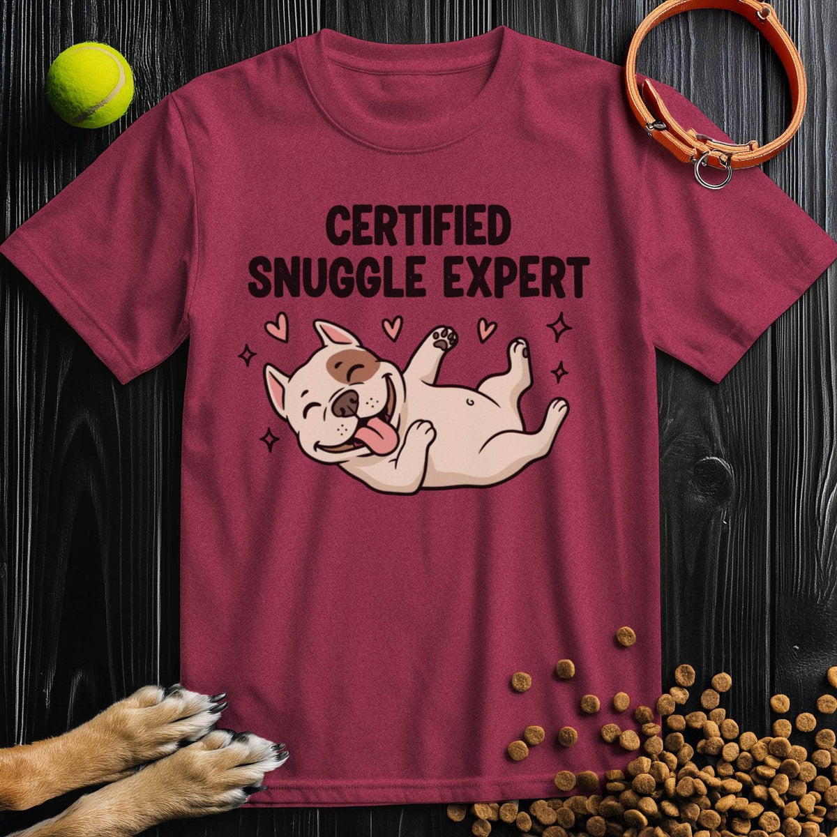 Maroon Certified Snuggle Expert T-Shirt featuring a joyful dog graphic, perfect for fans of cozy, cotton Dog Graphic Tees.
