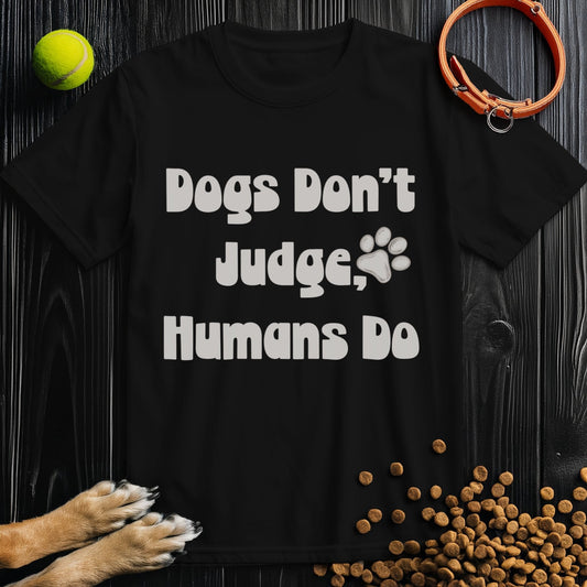 Ethical Dog TShirt in black with 'Dogs Don't Judge, Humans Do' slogan, made from sustainable ring-spun cotton, crew neck style.