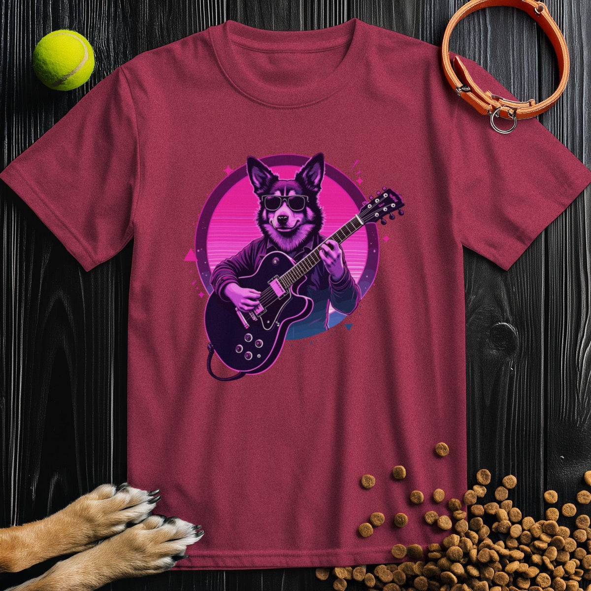 Maroon dog lover shirt with bold synthwave design of a dog playing guitar. Retro-inspired cotton tee perfect for music and pet fans.
