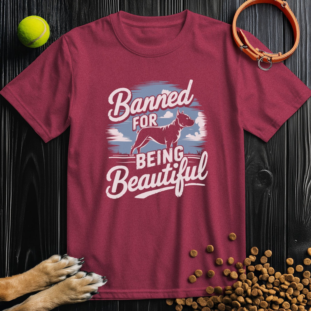 Maroon Banned for Beauty Dog Tee with bold pitbull graphic and text. Sustainable and comfortable t-shirt for pitbull advocates.