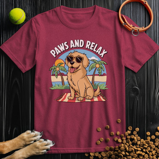 Pup's Day Off Tee in maroon featuring a cartoon dog lounging with sunglasses under palm trees. Made from 100% US cotton for dog lovers.