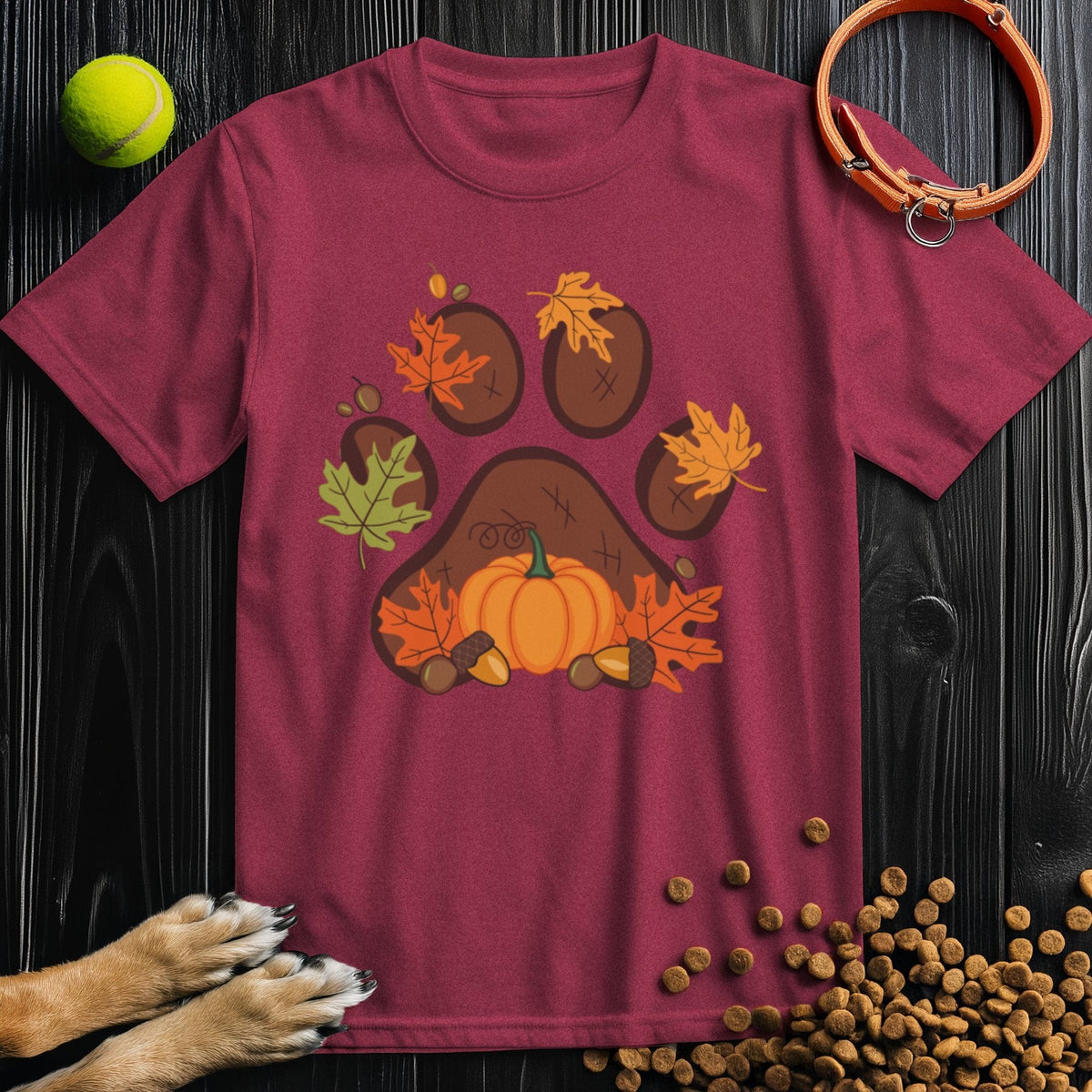Maroon dog t-shirt for humans featuring a fall-themed paw print with leaves and pumpkin, part of the Harvest Paw Prints eco-friendly cotton line.