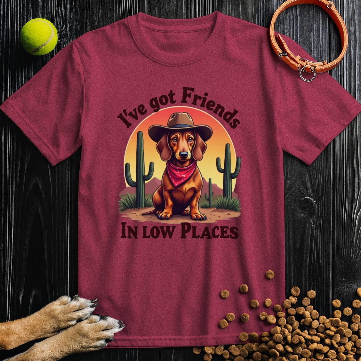 Maroon 'I've Got Friends In Low Places T-Shirt' with a fun dog graphic, great for dog lovers seeking a unique and comfy tee.