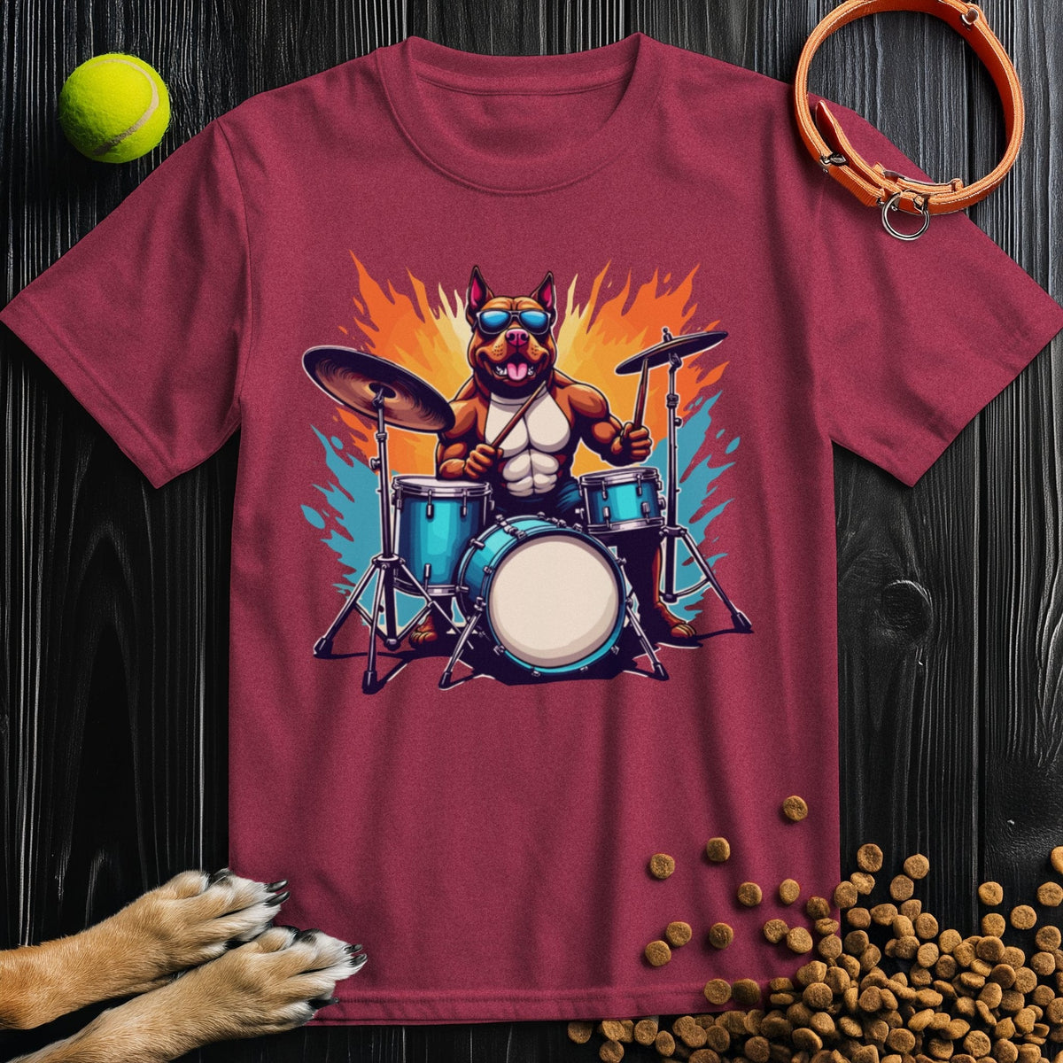 Maroon Premium Drum Dog T-Shirt with a dynamic cartoon dog playing drums. Stylish cotton shirt combining comfort and personality.