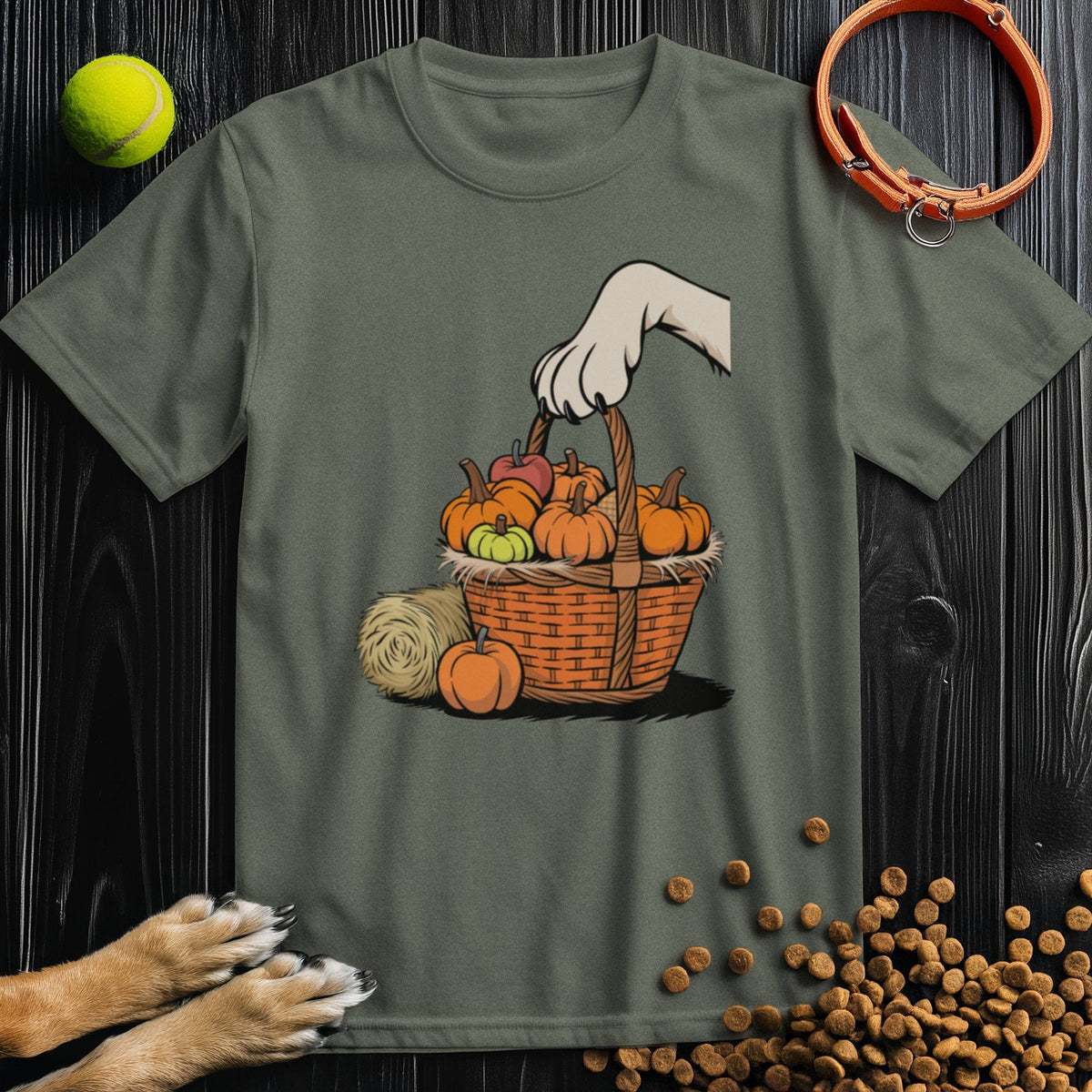 Olive green dog-themed T-shirt with fall basket and paw graphic. Ethically made from US cotton for comfort and durability.