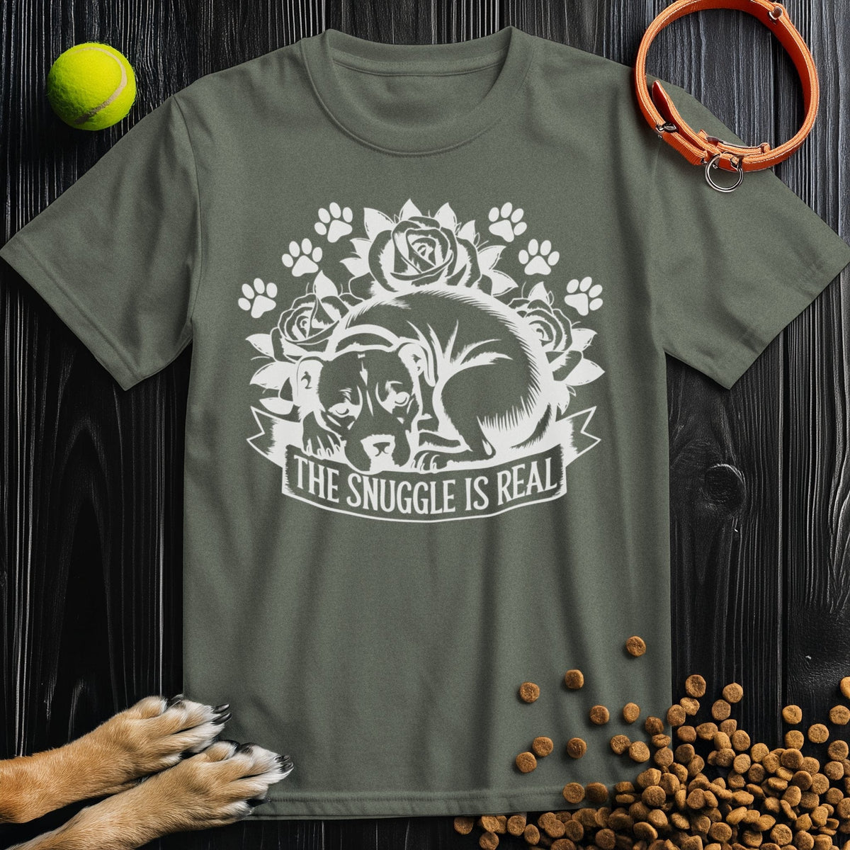 Olive green Snuggle Is Real dog-themed shirt with floral and paw print art, made of 100% cotton for year-round comfort.