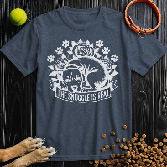 Snuggle Is Real Tee in navy blue featuring a dog curled up with paw prints and roses, made from 100% cotton for dog lovers.