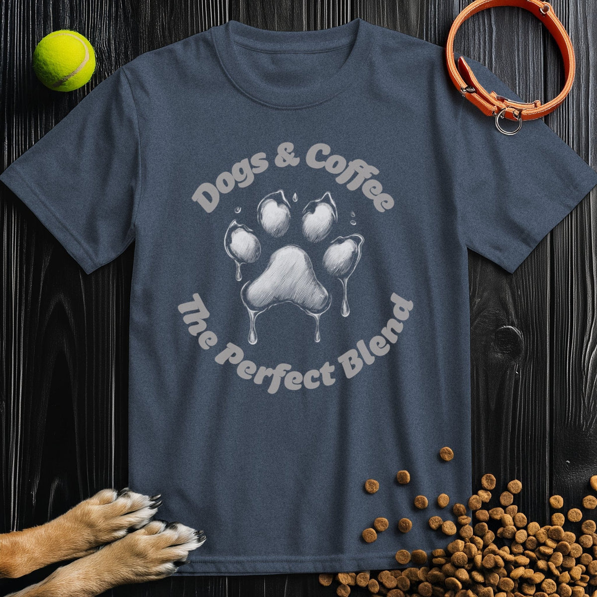 Navy blue Dogs & Coffee Tee Shirt featuring a white paw print and fun slogan, perfect for dog enthusiasts. Ethically made cotton tee by Good Boy Mob.