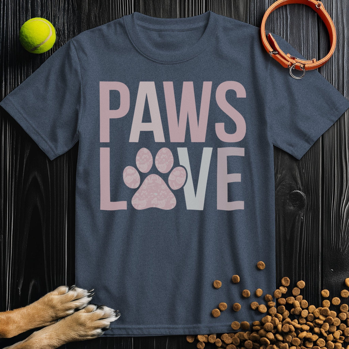 Navy blue Paws Love T-Shirt featuring pink paw print design. 100% cotton dog theme shirt with regular fit and crew neck.