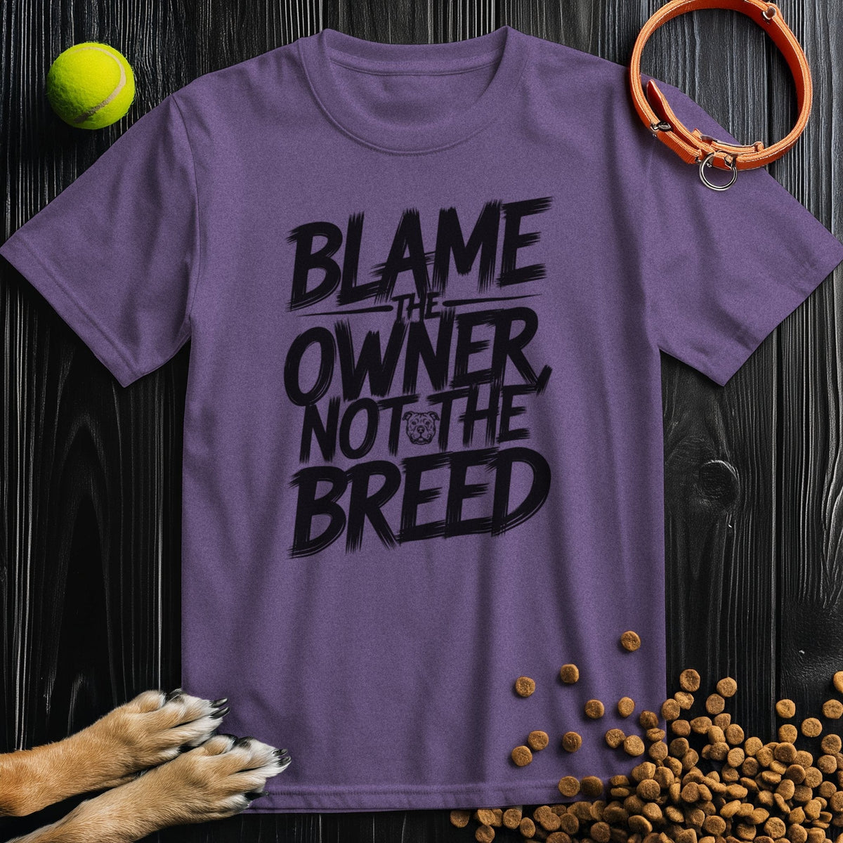 Purple crew neck t-shirt for dog lovers with 'Blame the Owner Not the Breed' message. Sustainable and perfect for casual wear.