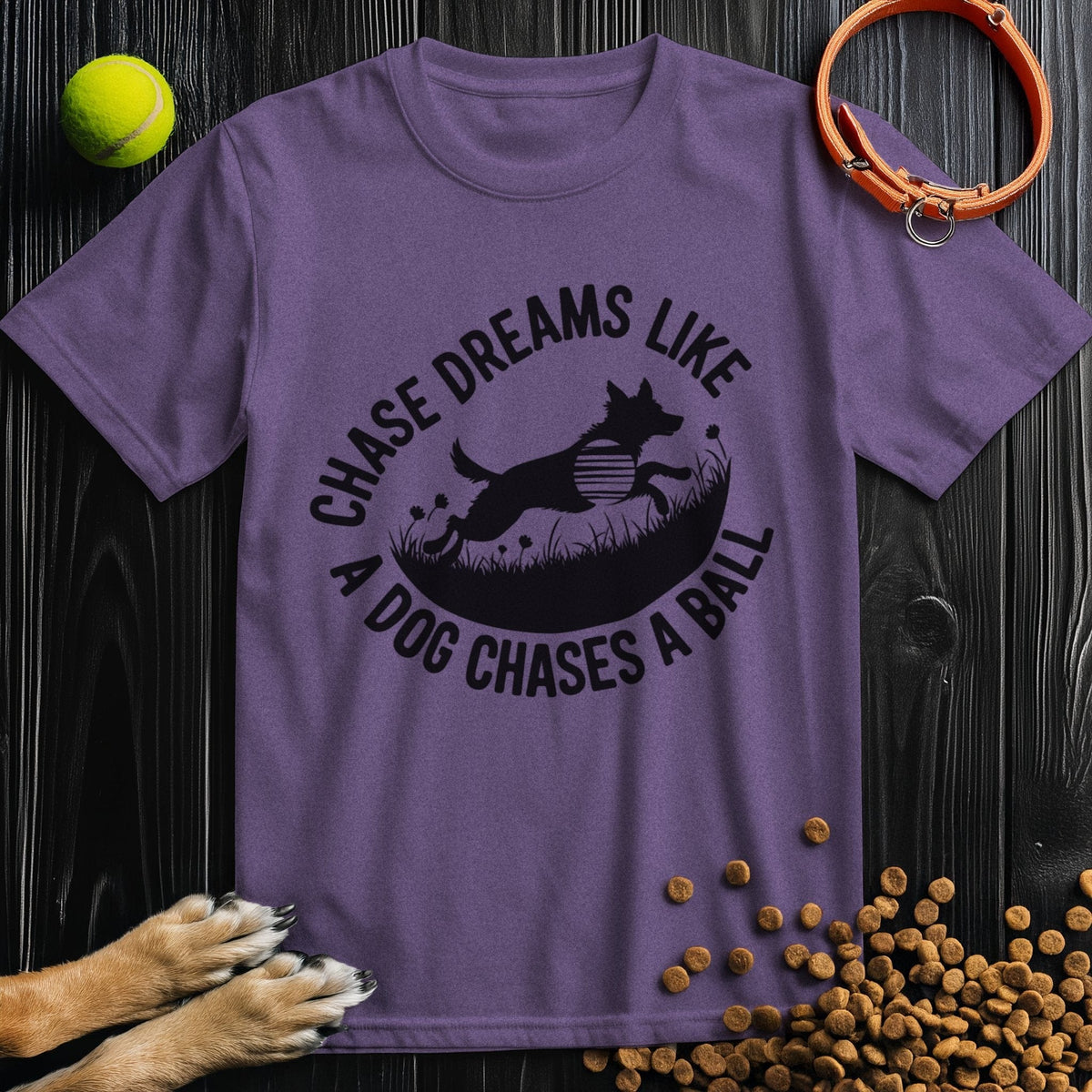 Purple Chase Dreams T-Shirt featuring a dog silhouette and motivational quote. Cotton crew neck ideal for dog lovers and casual wear.