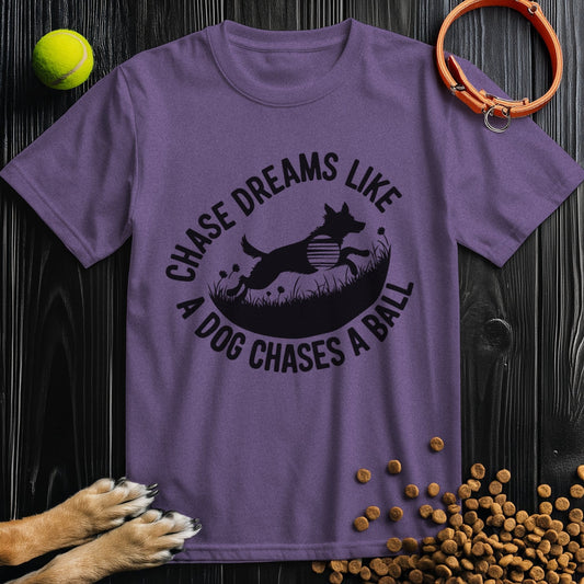 Purple Chase Dreams T-Shirt featuring a dog silhouette and motivational quote. Cotton crew neck ideal for dog lovers and casual wear.