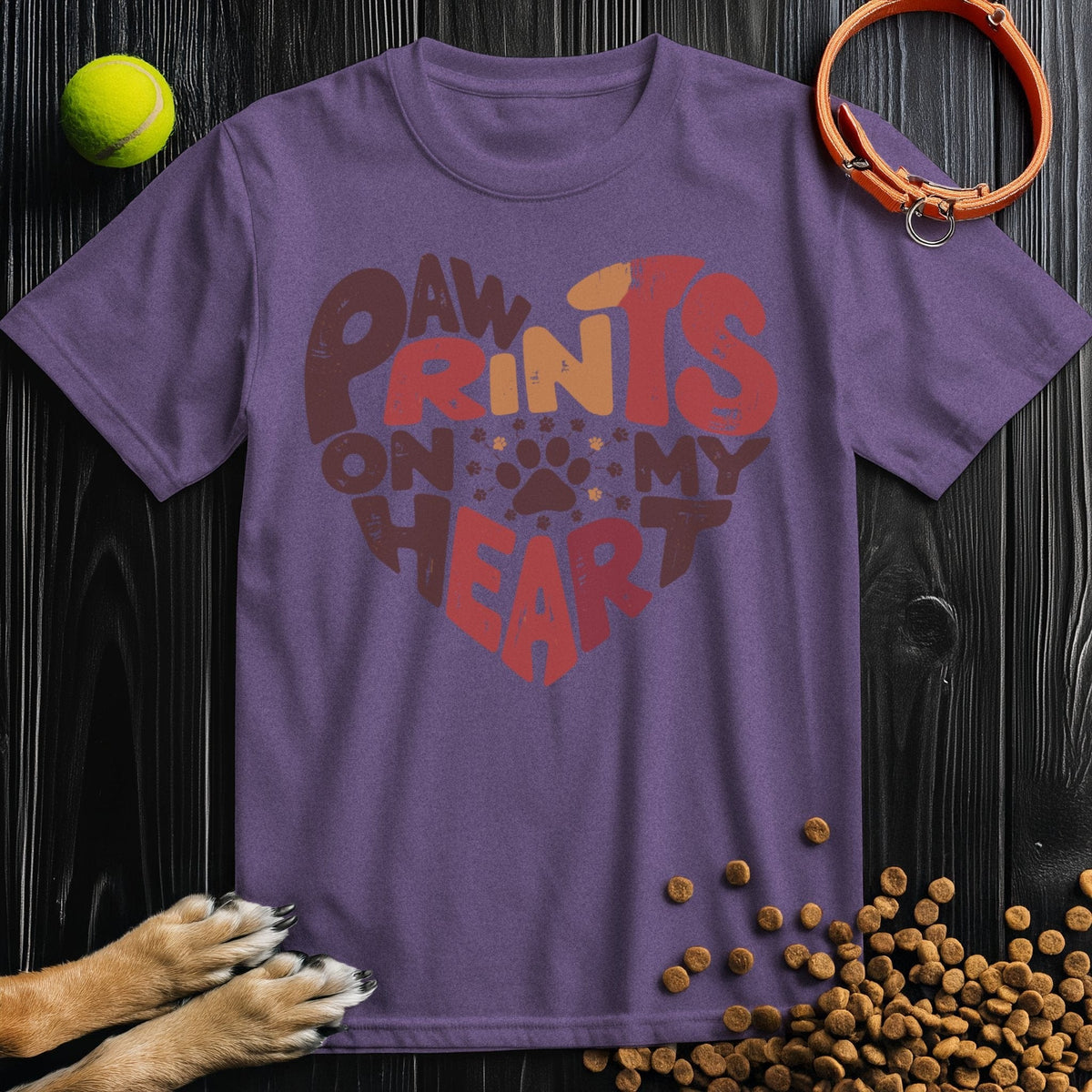 Purple Paw Print Heart T-Shirt with vibrant heart-shaped dog print. A fun and comfy cotton shirt for animal lovers.