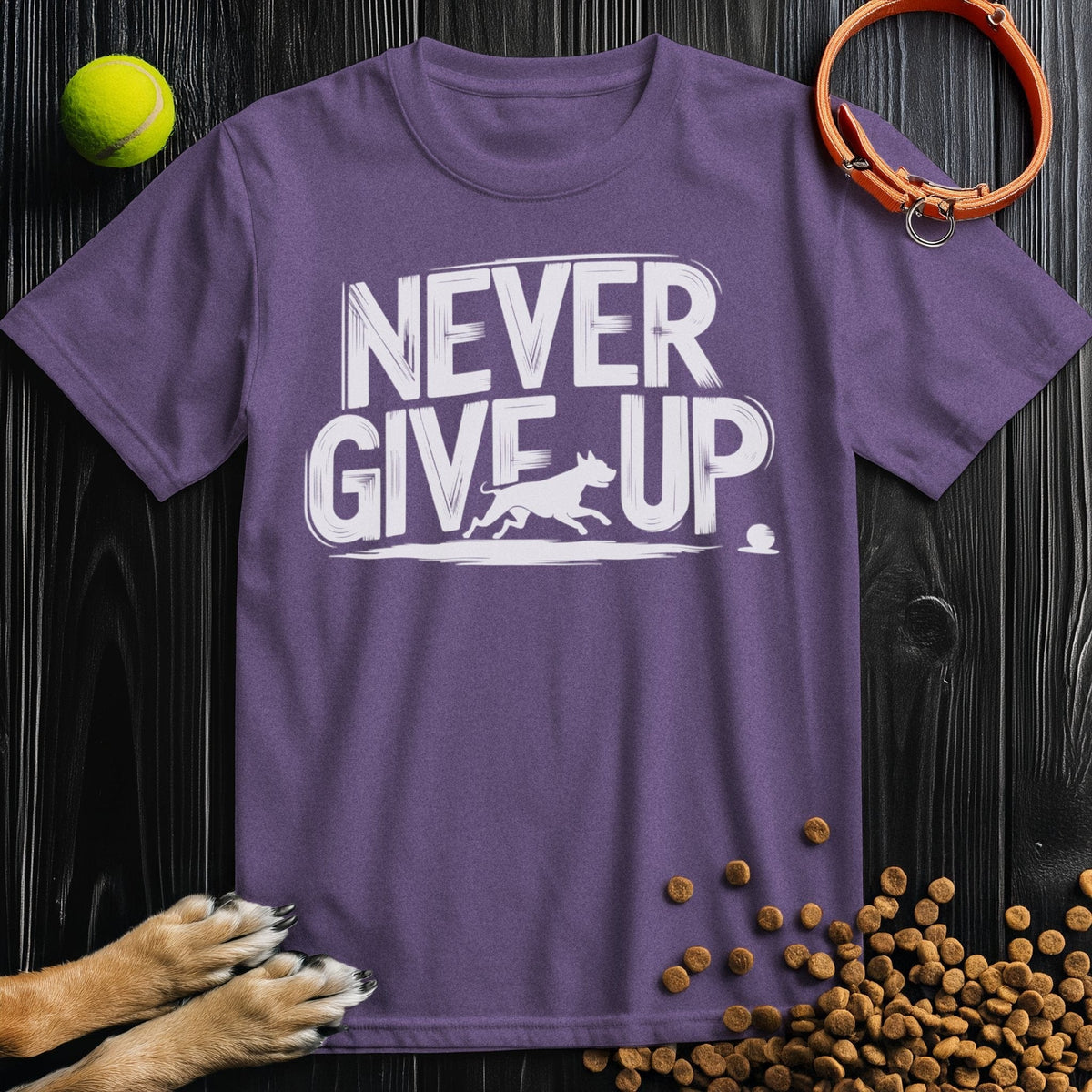 Never Give Up Tee in purple with motivational dog design. Unisex cotton t-shirt great for pet lovers and everyday casual outfits.