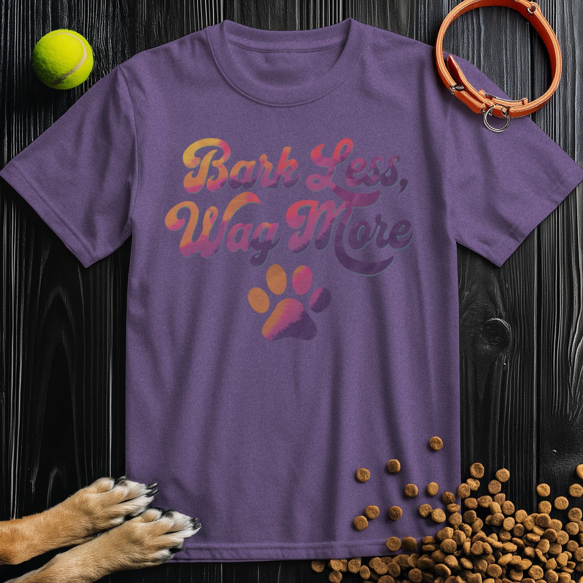 Dog Lover Shirt - Bark Less, Wag More in purple, unisex cotton tee with colorful text and paw design, ideal for dog owners and casual wear.