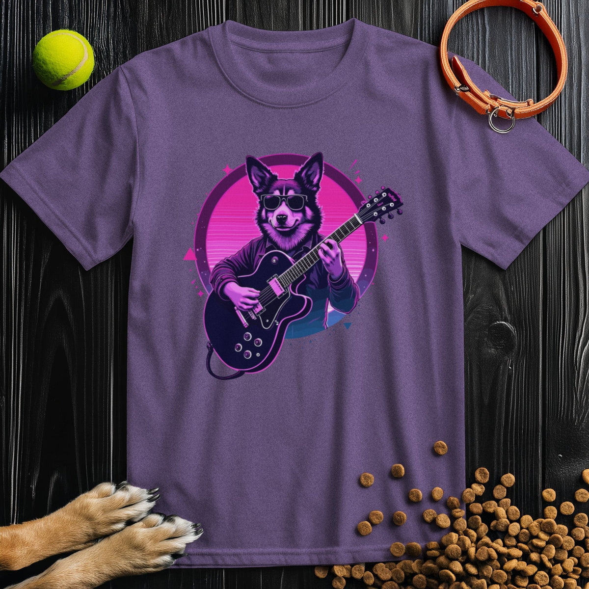 Purple retro-style T-shirt with synthwave dog guitarist print. A fun and bold cotton shirt for dog lovers and 80s aesthetic fans.