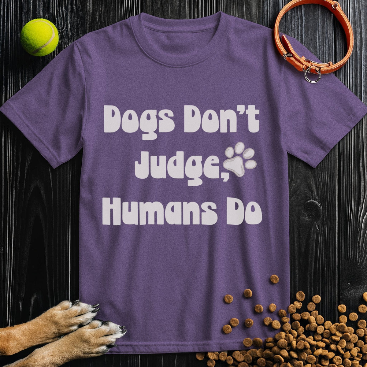 Purple Ethical Dog TShirt with 'Dogs Don't Judge, Humans Do' text, eco-conscious cotton blend, ideal for casual summer wear.