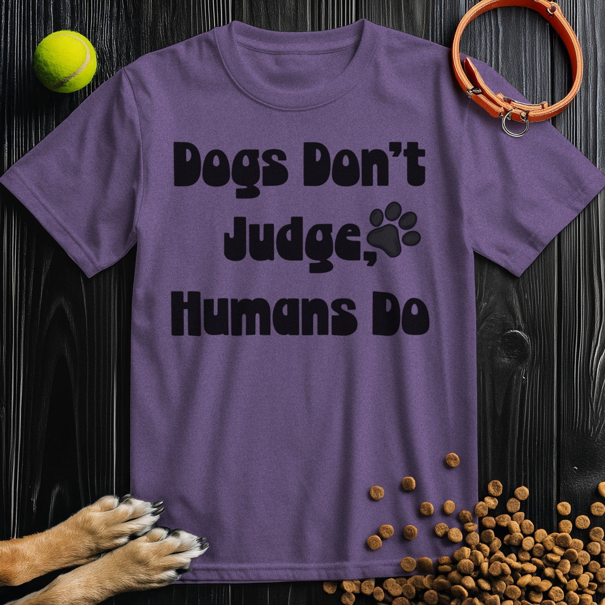 Purple 'Dogs Don't Judge, Humans Do' dog shirt in soft cotton, featuring a paw print design, perfect for casual pet-themed fashion.
