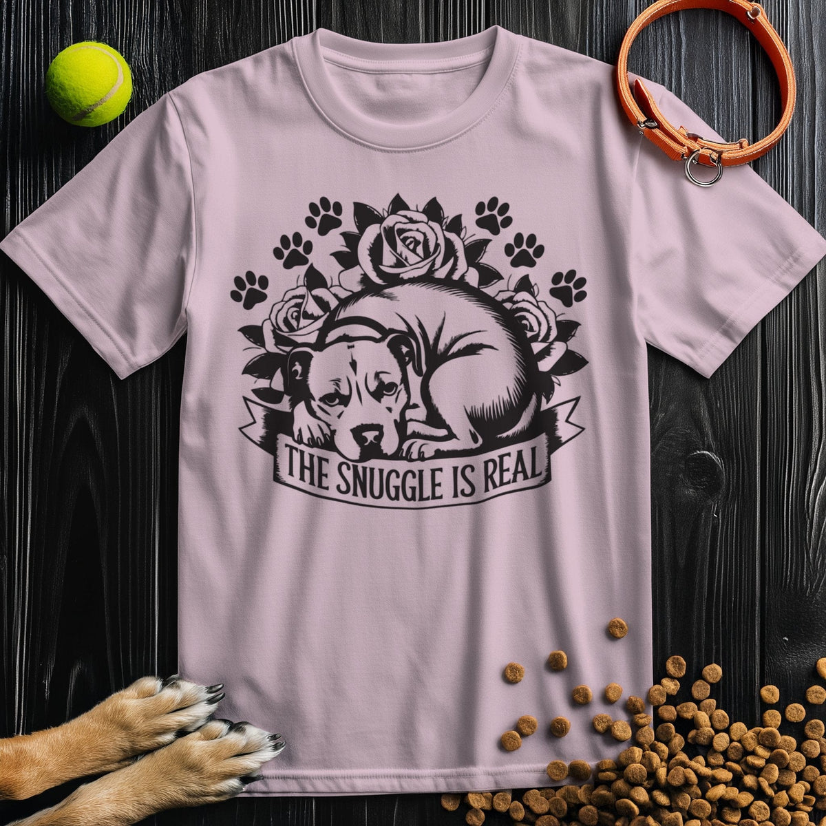 Snuggle Is Real Black T-Shirt in light pink, adorned with a dog and floral design, ideal for pet lovers seeking a soft cotton shirt.