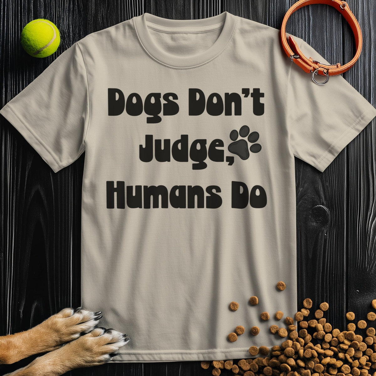 Beige dog-themed t-shirt with 'Dogs Don't Judge, Humans Do' text, crafted from 100% ring-spun cotton for a regular fit and summer wear.