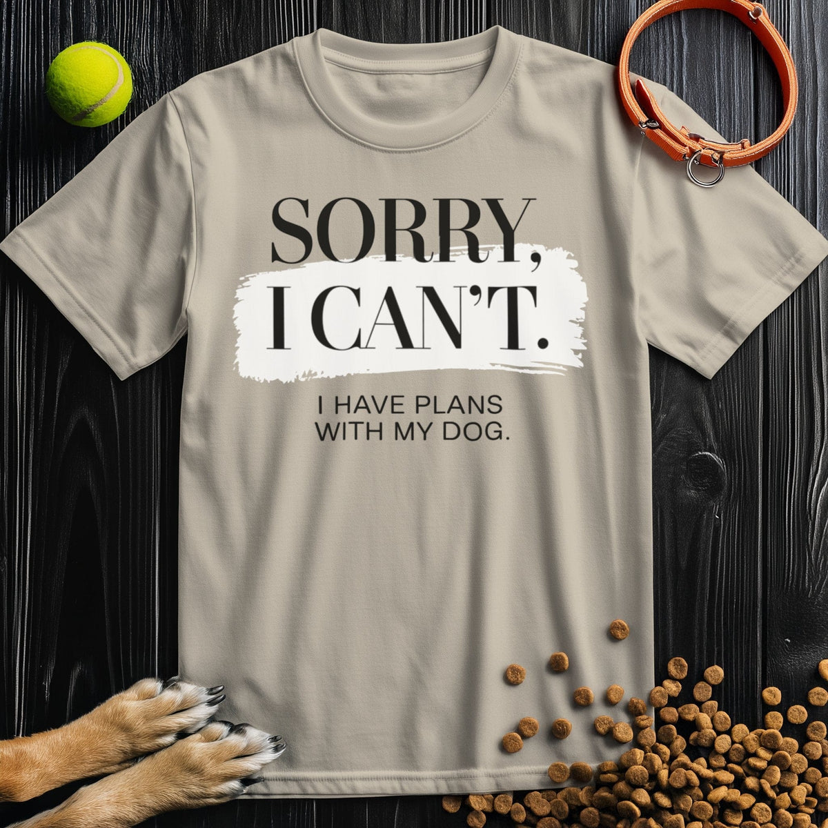 Beige Dog Lover Edition T-Shirt with 'Sorry, I Can't. I Have Plans With My Dog' text, made from 100% cotton, crew neck fit for pet enthusiasts.