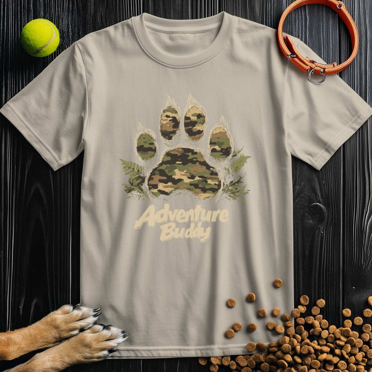 Beige Camo Paw Adventure T-Shirt featuring camo paw print and 'Adventure Buddy' text, soft cotton tee for casual dog-themed wear.