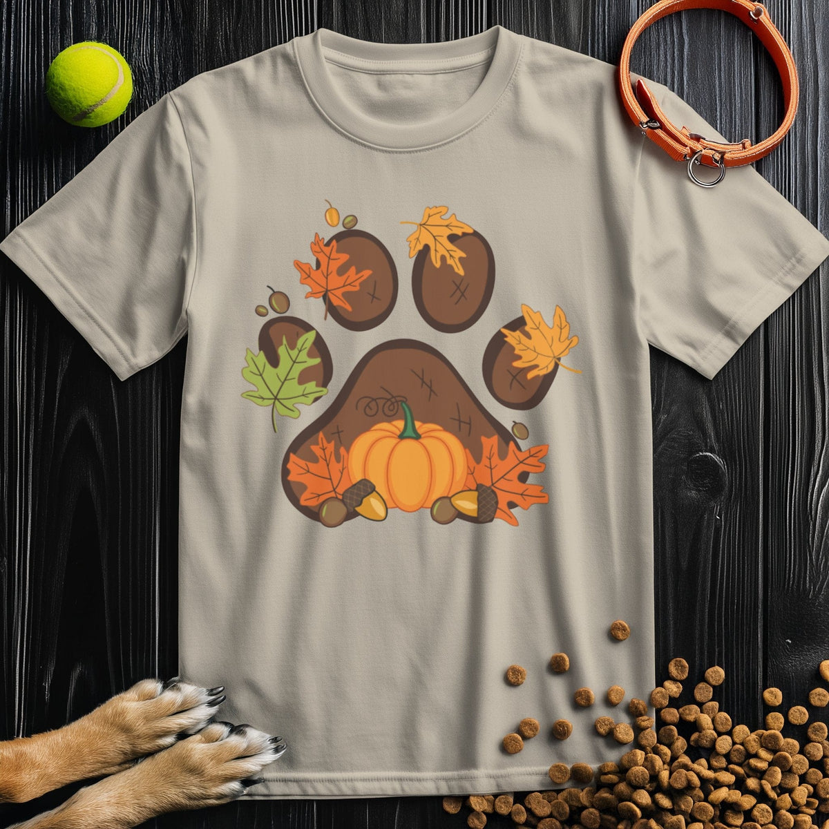 Beige Dog T-Shirt for Humans from Harvest Paw Prints Collection featuring a fall-themed paw print with leaves and pumpkin, made of 100% cotton.